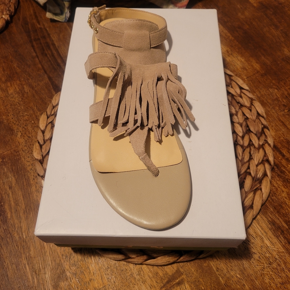 Tan fringe thong sandals (one pair)